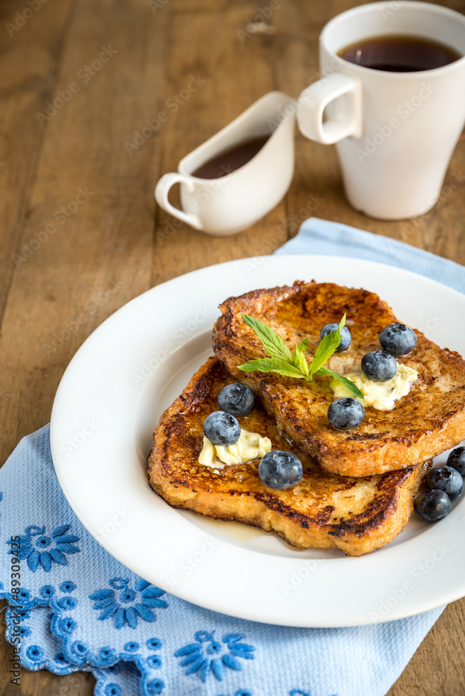 French toasts with fresh blueberries and maple syrup French toasts with fresh blueberries and maple syrup