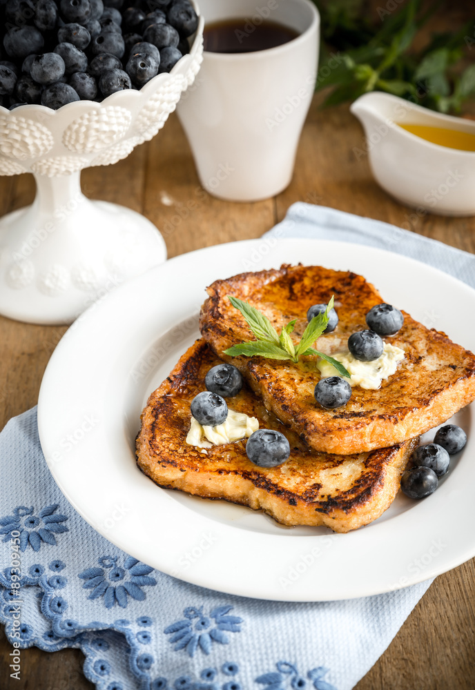 French toasts with fresh blueberries and maple syrup French toasts with fresh blueberries and maple syrup