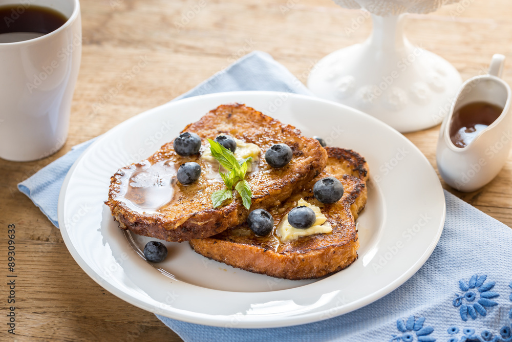 French toasts with fresh blueberries and maple syrup French toasts with fresh blueberries and maple syrup
