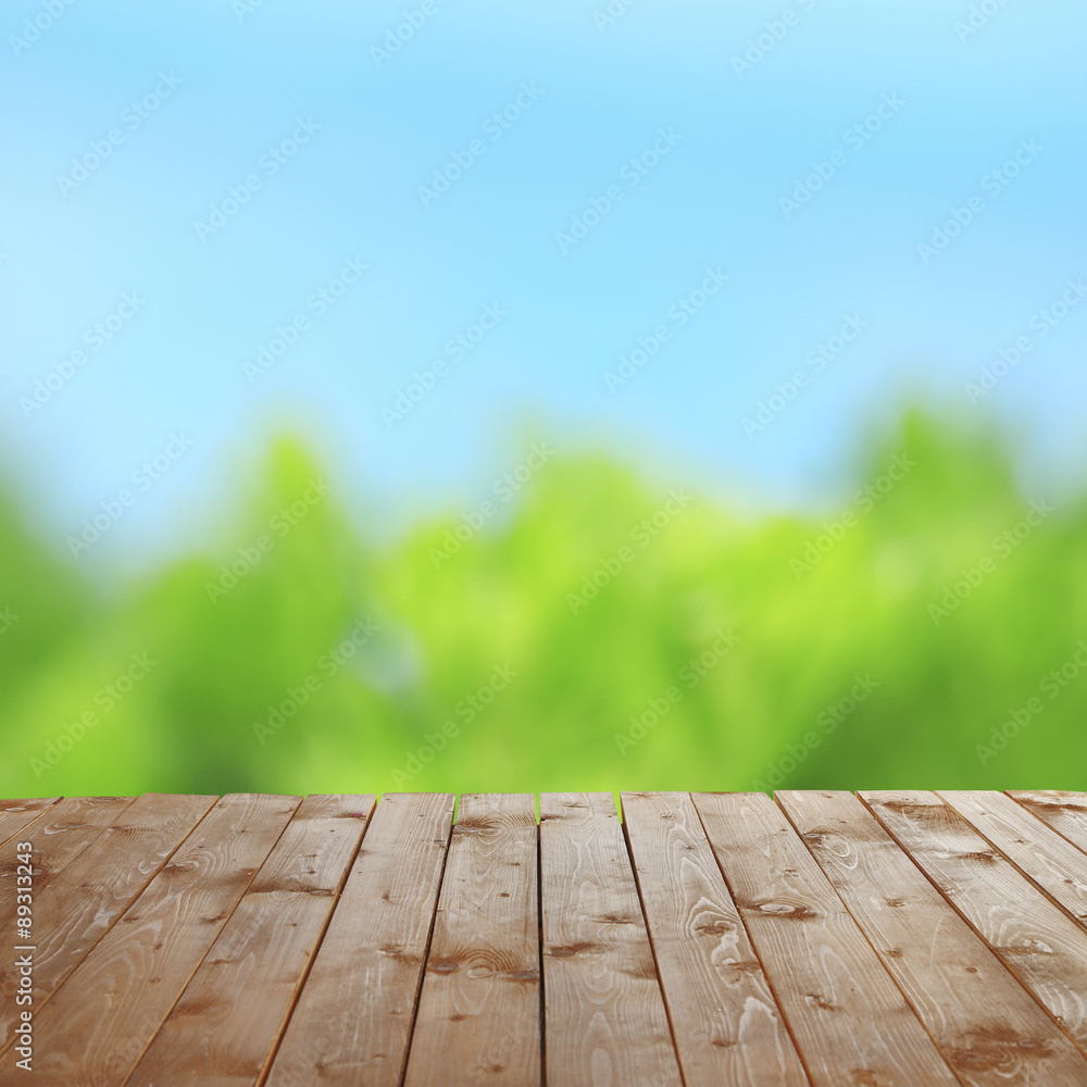 Wooden table  with abstract  blur background