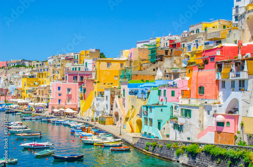 italian island procida is famous for its colorful marina, tiny narrow streets and many beaches which all together attract every year crowds of tourists coming from naples - napoli. photo