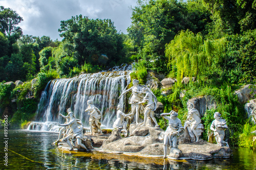 Photos 2 kilometers long promenade leading through gardens of imperial palace in caserta is decorated by many fountains and statues from bernini and ends by artificial waterfall