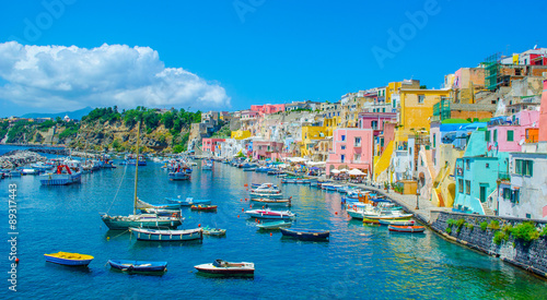 italian island procida is famous for its colorful marina, tiny narrow streets and many beaches which all together attract every year crowds of tourists coming from naples - napoli.