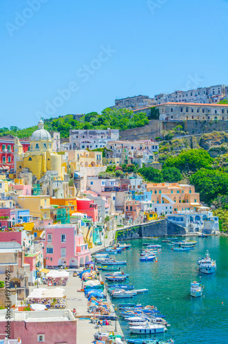 italian island procida is famous for its colorful marina, tiny narrow streets and many beaches which all together attract every year crowds of tourists coming from naples - napoli.