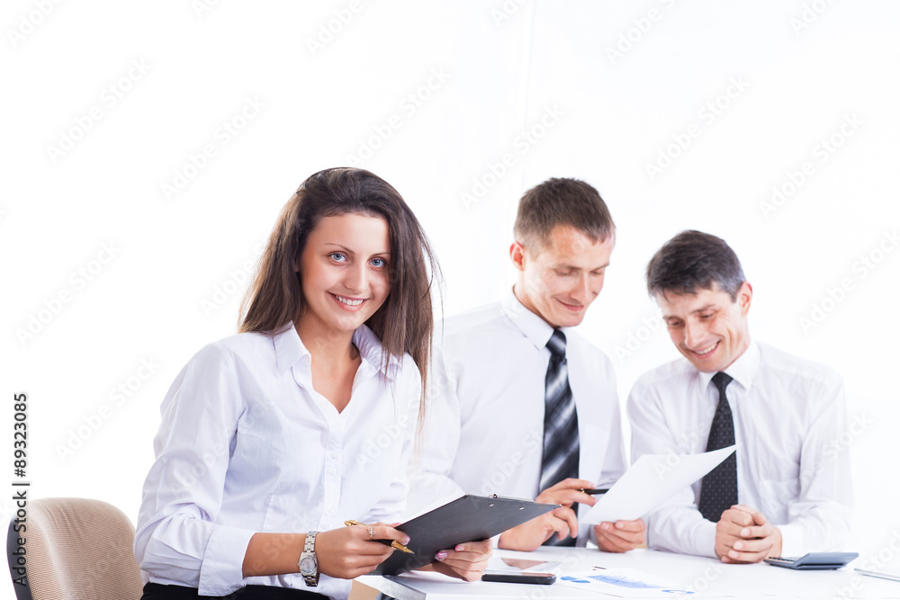 A group of businessmen discussing the policy of the company in t A group of businessmen discussing the policy of the company in t