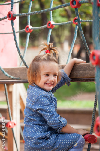 Photos girl at action-oriented playground