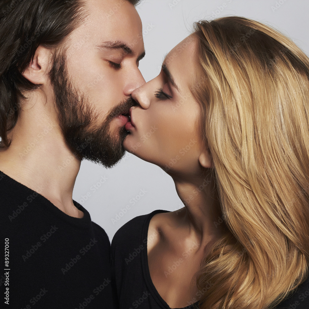 Kissing couple.beautiful woman and handsome man.lovely boy and girl Kissing couple.beautiful woman and handsome man.lovely boy and girl