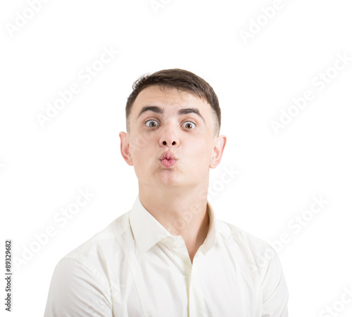 portrait of a young funny man with kissy lips
