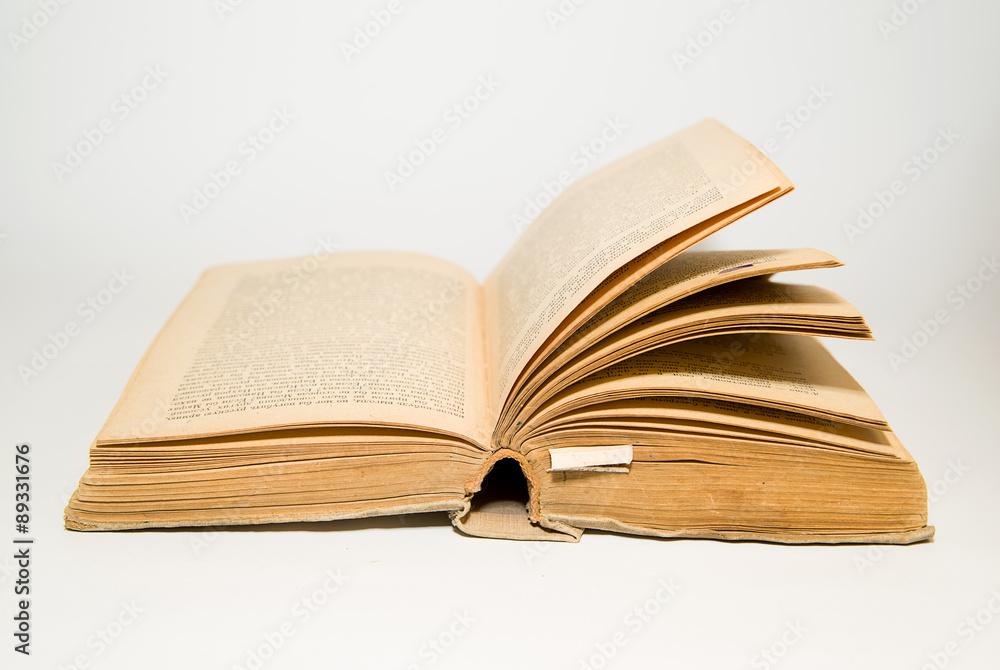 Obraz premium Open old book on a white background