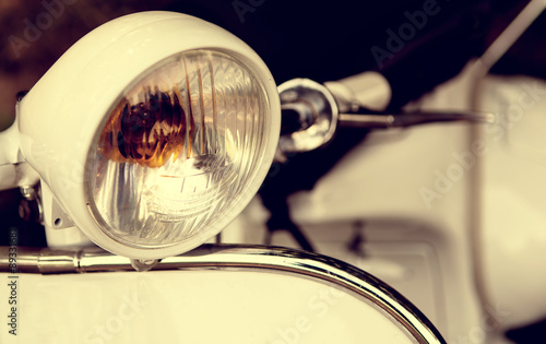 old headlight of scooter photo