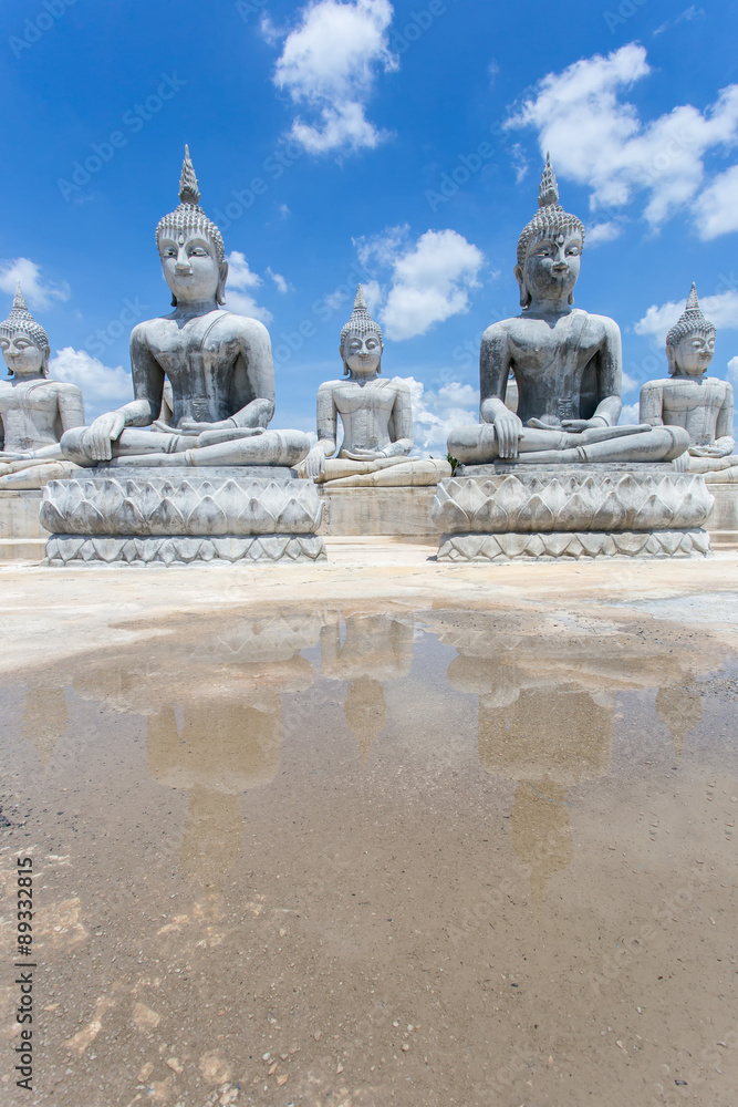 Buddha statue and blue sky, Nakhon Si Thammarat Province, Thailand.