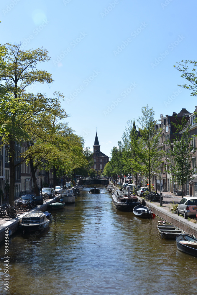 Fototapeta premium Church and canal in Amsterdam