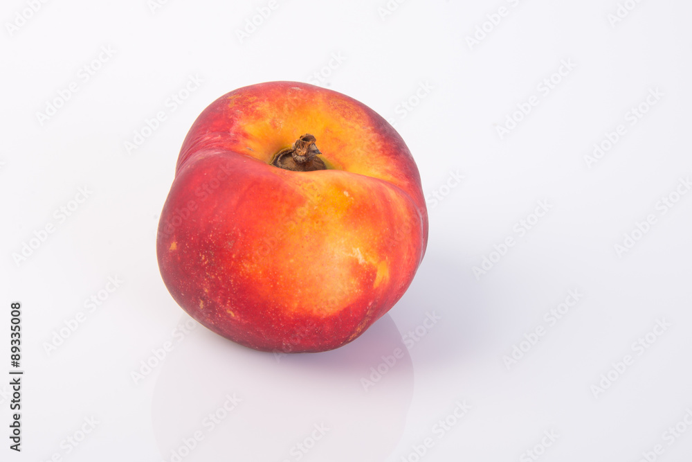 flat peaches (donut peaches) on a background flat peaches (donut peaches) on a background