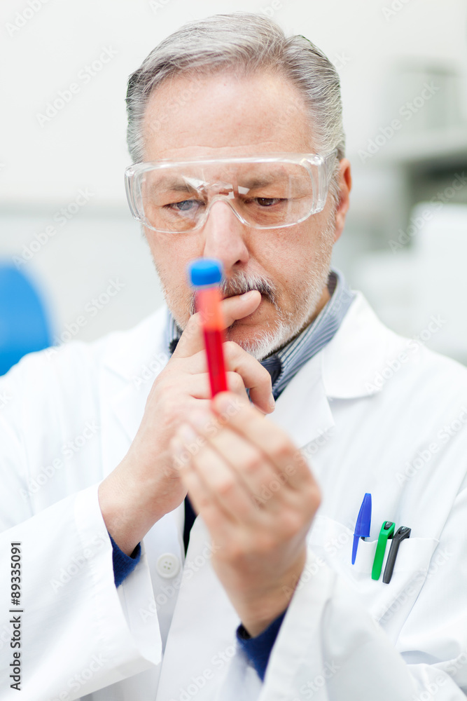 Researcher working in a laboratory Researcher working in a laboratory