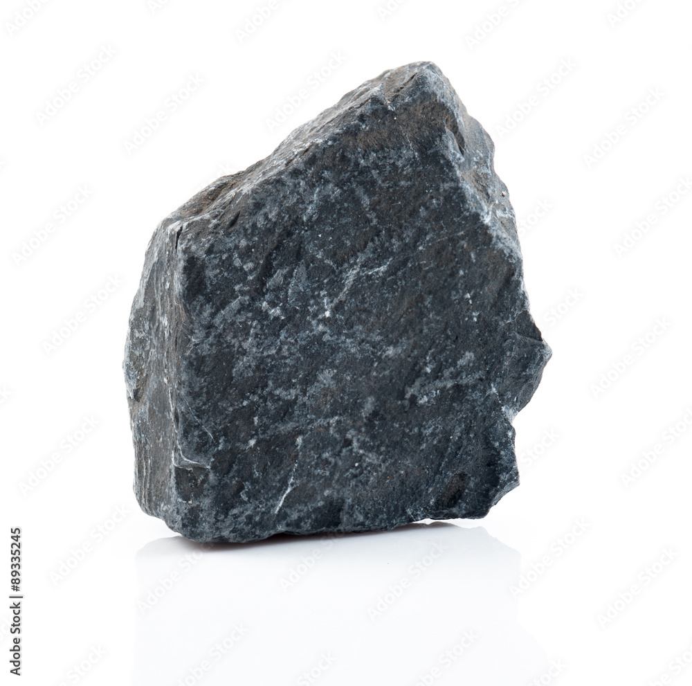Fragment of granite on a white background. Fragment of granite on a white background.