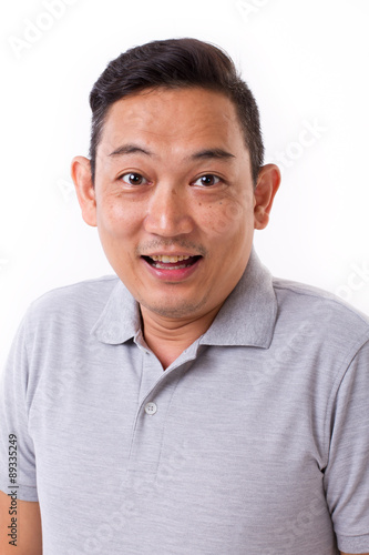 portrait of happy, content asian man