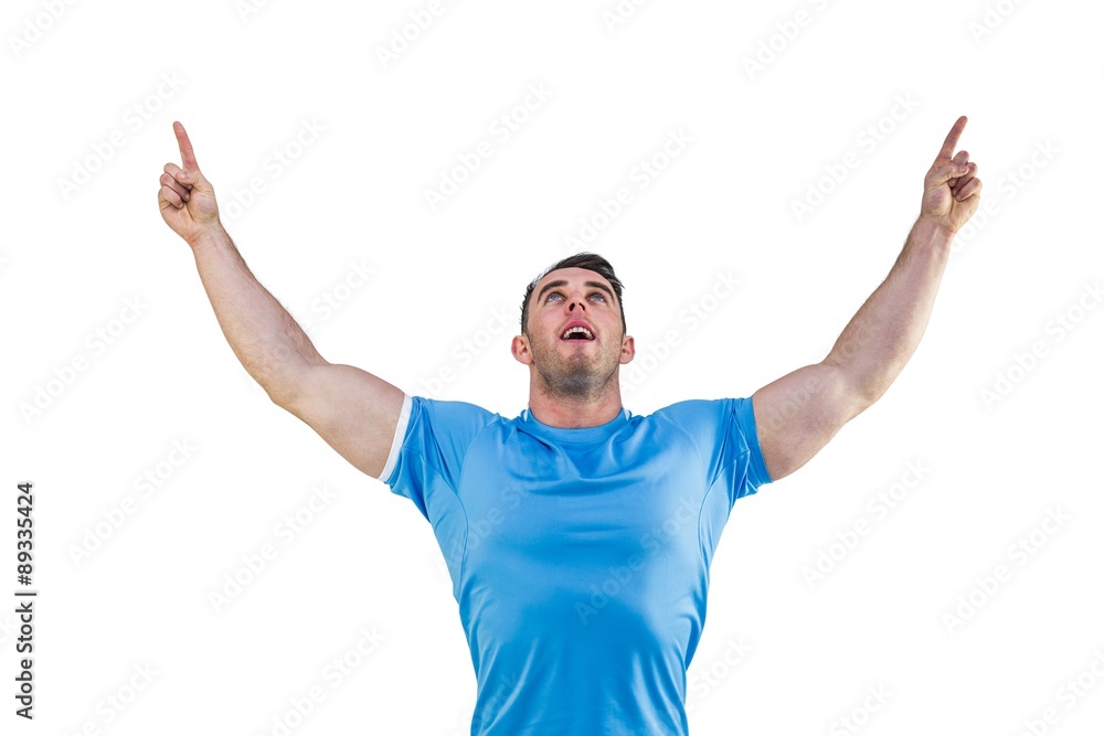 Rugby player cheering and pointing Rugby player cheering and pointing