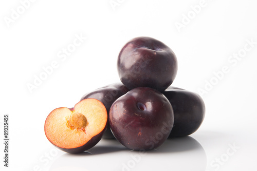 Ripe plum fruit on a background
