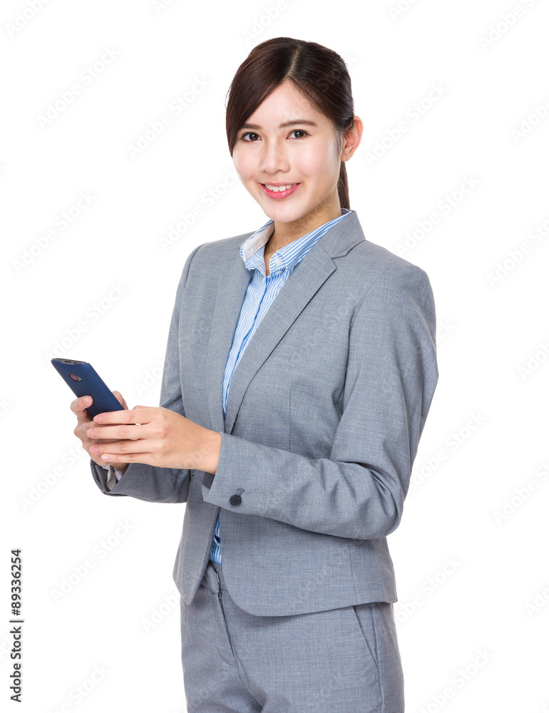 Young Businesswoman use of the cellphone Young Businesswoman use of the cellphone