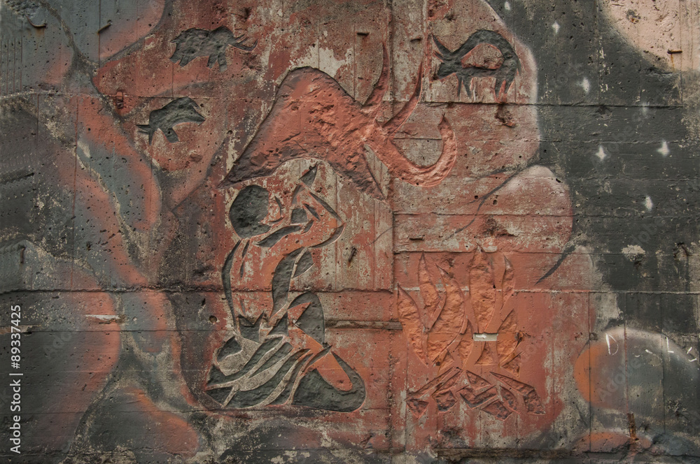 The picture on the wall/Graffiti pattern primitive man and animal in ethnic style

