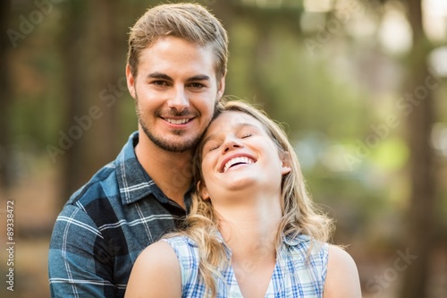 Happy smiling couple embracing