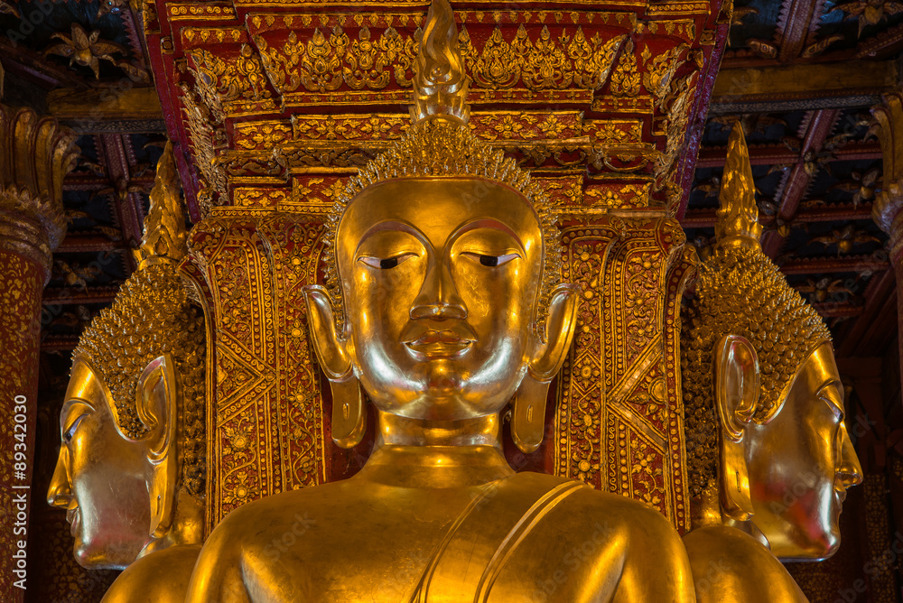 Golden Buddha image in temple of Wat Phumin in Nan, Thailand