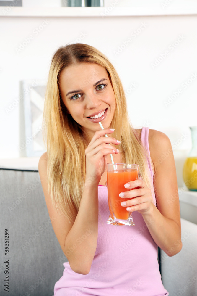 Young beautiful woman drinking fresh juice Young beautiful woman drinking fresh juice