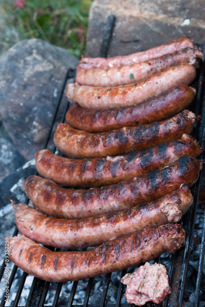 Fototapeta premium grilled sausages on the grill