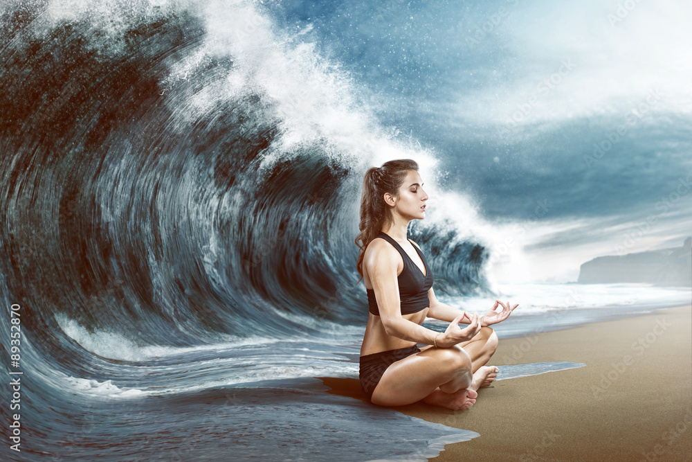 Woman relaxes in front of big wave