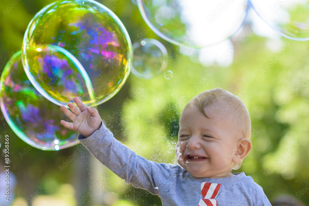 Cute Baby Catching Soap Bubbles Cute Baby Catching Soap Bubbles