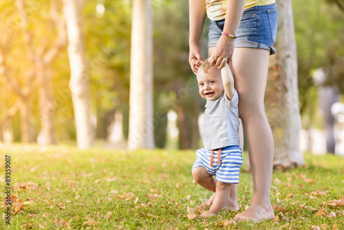 Happy Child Making First Steps