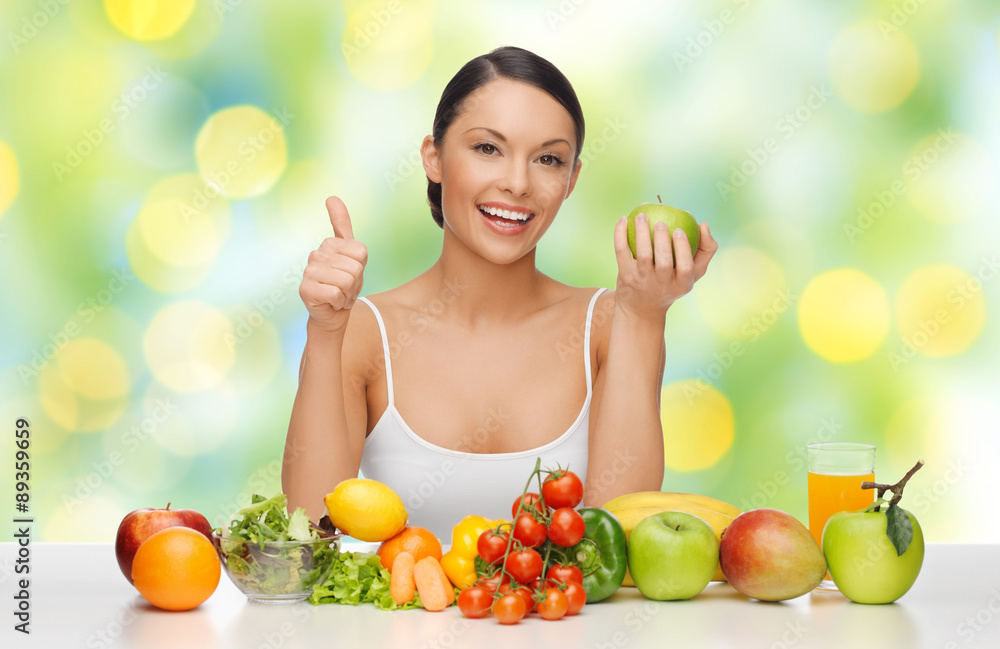 happy woman with healthy food showing thumbs up happy woman with healthy food showing thumbs up