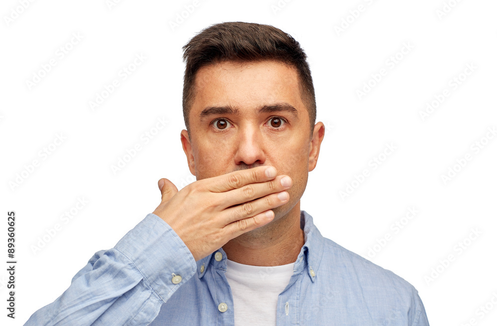 face of man covering his mouth with hand palm face of man covering his mouth with hand palm