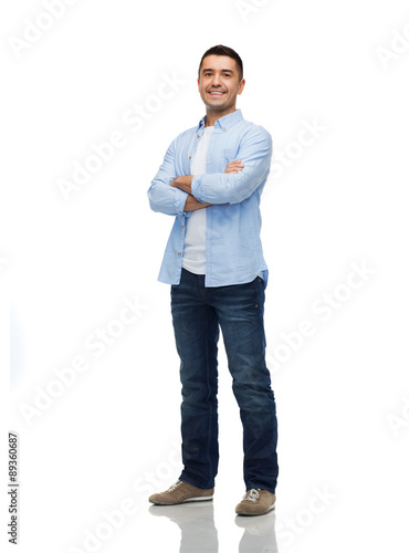 smiling man with crossed arms photo
