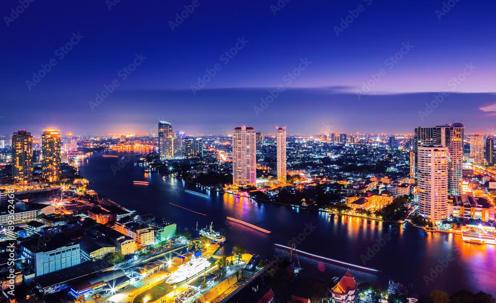 Fototapeta premium Modern building at riverside in night scene