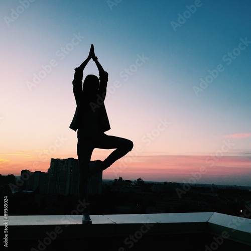 yoga practicioner during sunset meditation