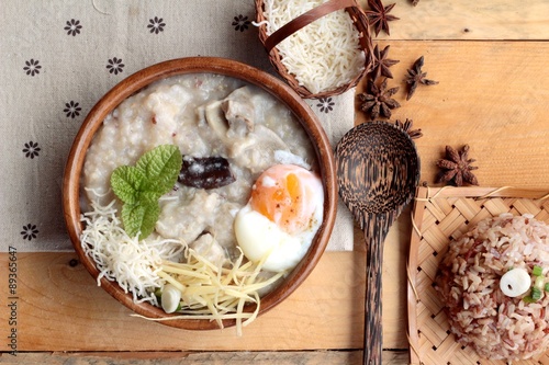 Brown rice porridge put pork and brown rice with soft-boiled egg
