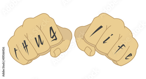 Clenched man fists with tattoo