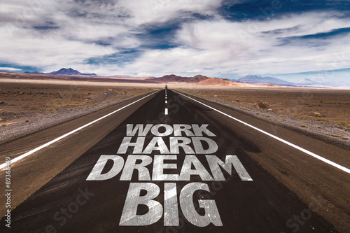 Work Hard Dream Big written on desert road