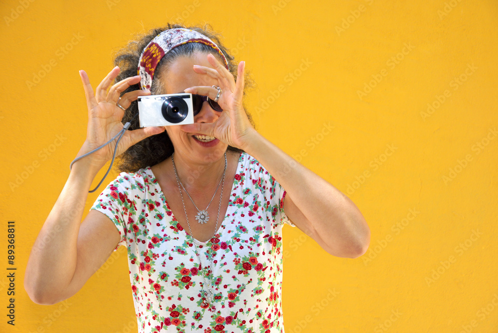 Woman Photographing with Point-and-Shoot