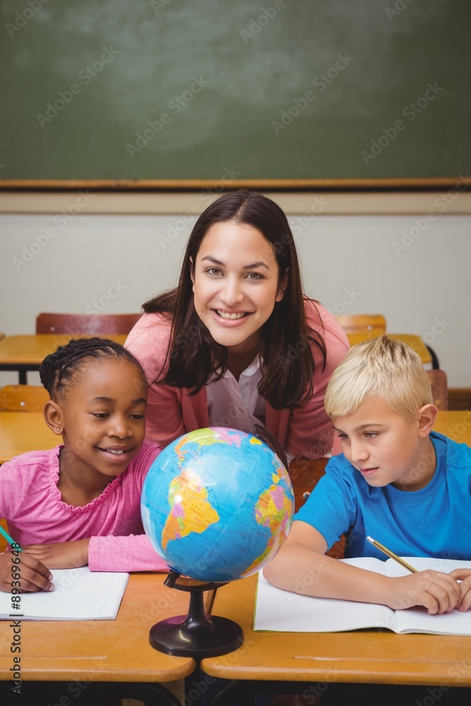 Fototapeta premium Teacher sitting with her students