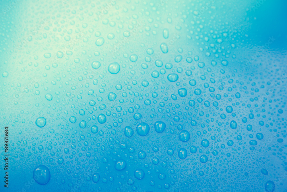 Drops of water on blue floor Drops of water on blue floor