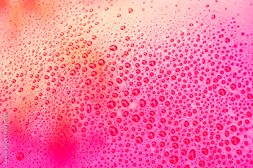 Drops of water on red floor Drops of water on red floor