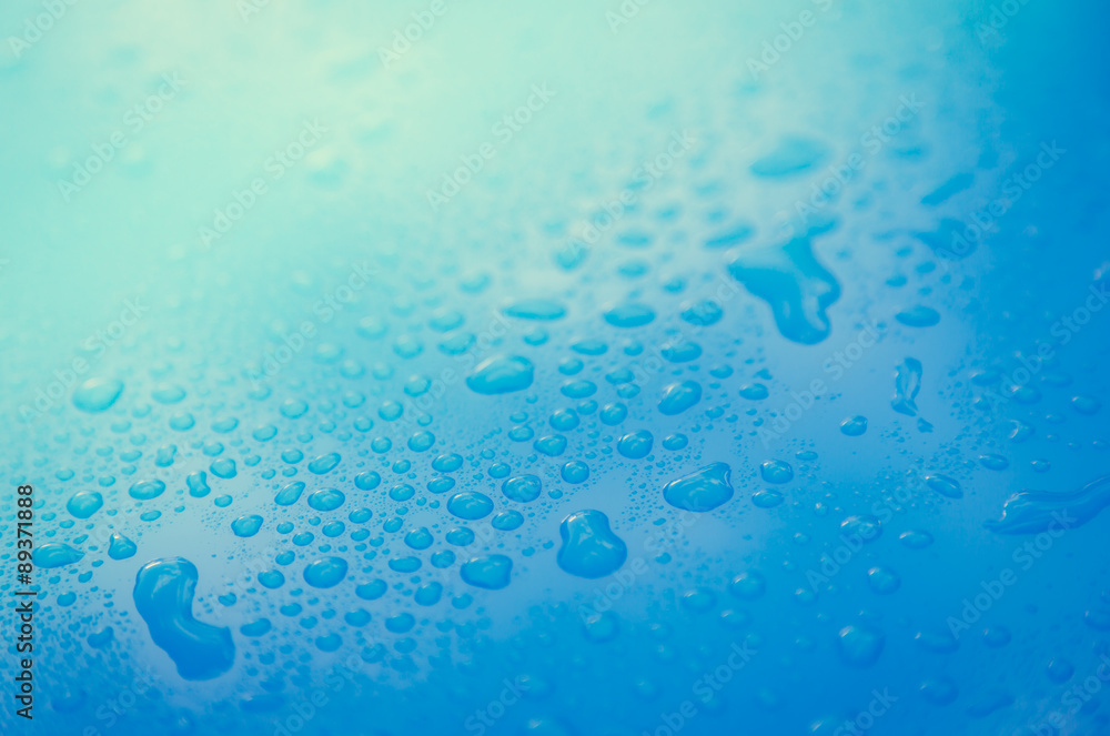 Drops of water on blue floor