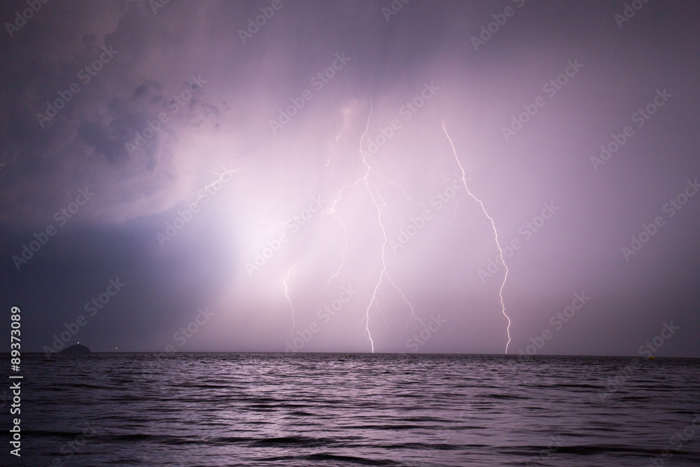 Spectacular lightnings striking the surface of sea