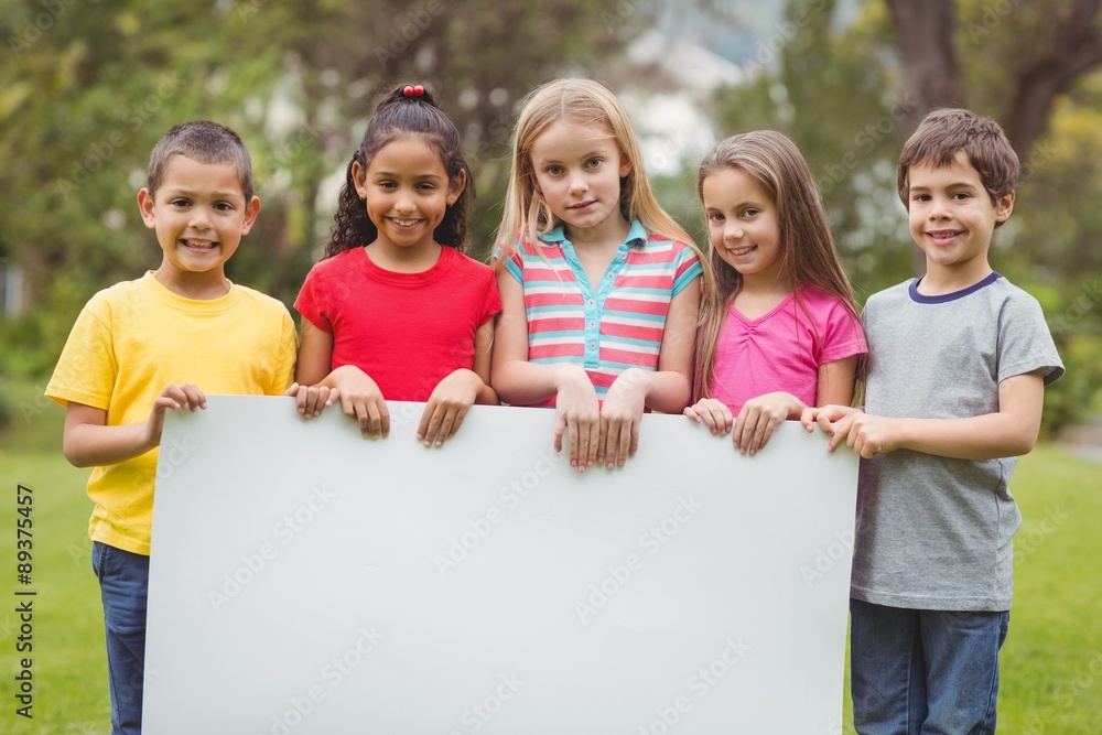 Cute pupils showing large poster Cute pupils showing large poster