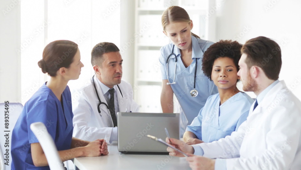 group of doctors with laptop meeting at hospital group of doctors with laptop meeting at hospital