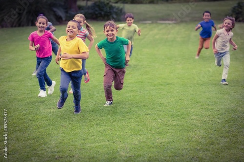 Cute pupils running towards camera © WavebreakMediaMicro