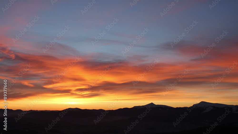 Sunrise timelapse in mountains with colourful clouds Sunrise timelapse in mountains with colourful clouds