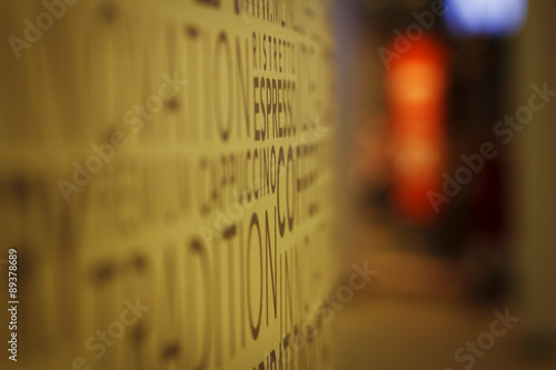 pismena na stenu and cofe text with blur background